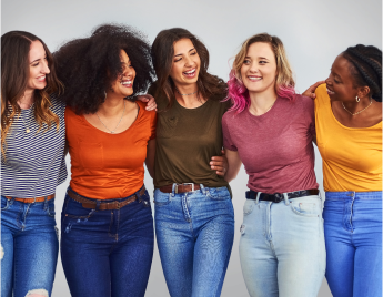 5 women embracing each other and smiling